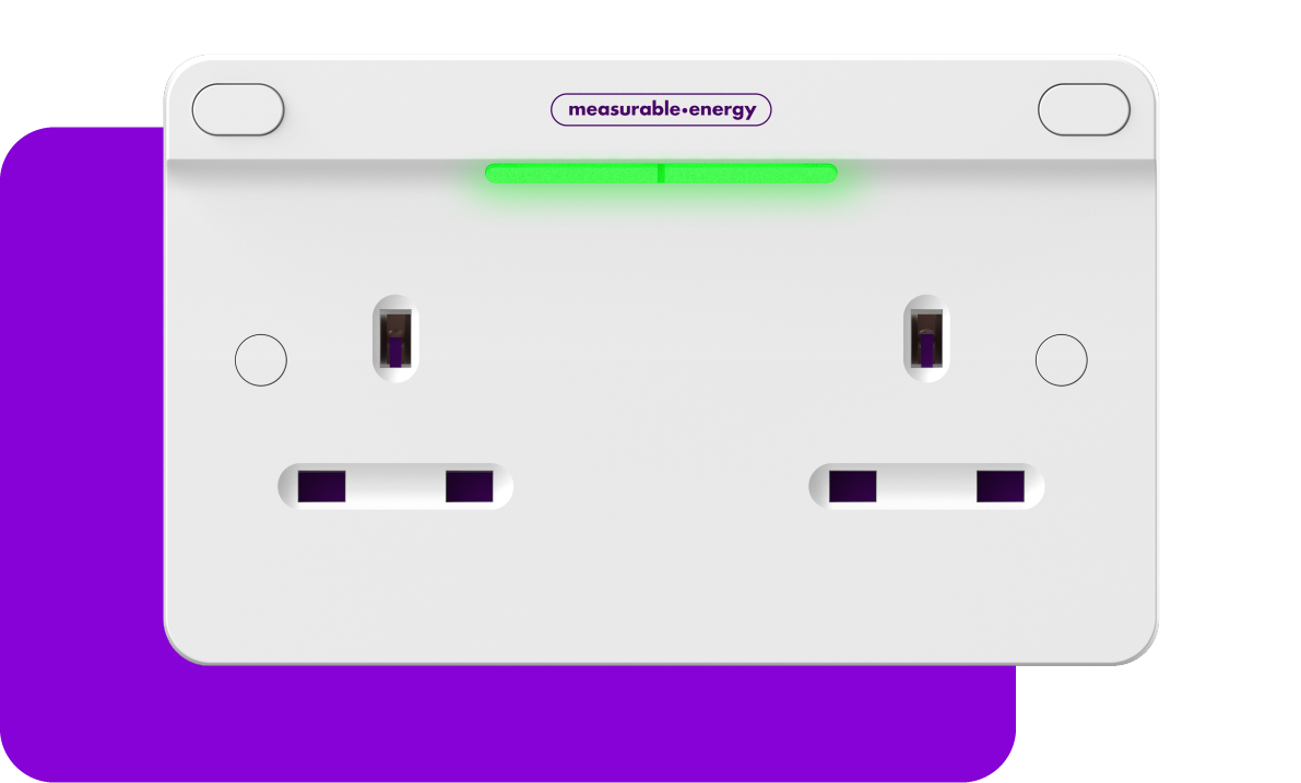 A 2 gang measurable.energy plug socket showing a green LED light against a light purple background.